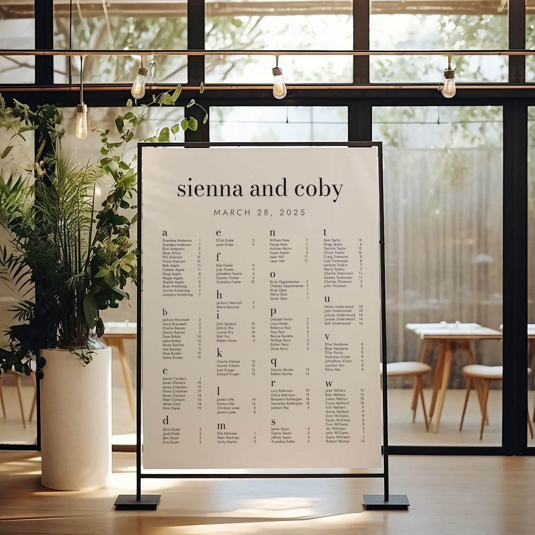 Wedding Seating Chart on Black Stand with ights above