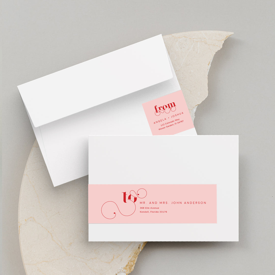 White Envelopes with Pink and Red Labels on Broken Crockery