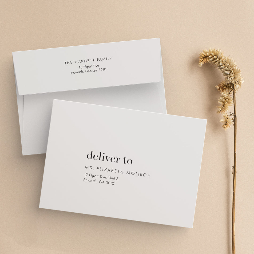 Modern Envelopes on Beige Background with Wild Flower