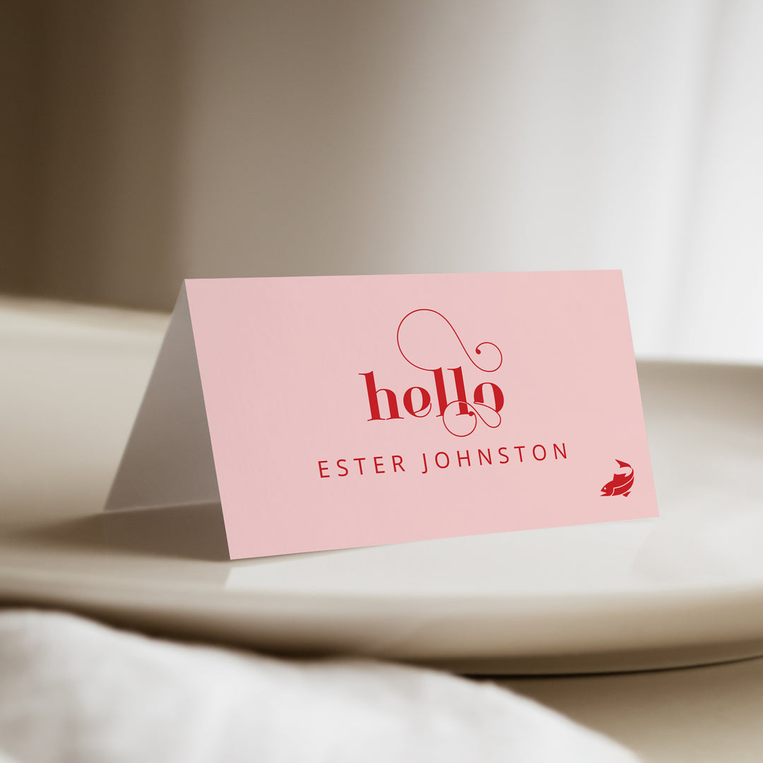 Red and Pink Place Card on a Neutral Background