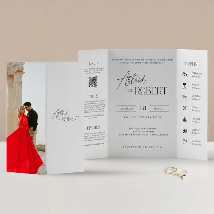 Woman in a red dress on the cover of a gatefold wedding invitation.