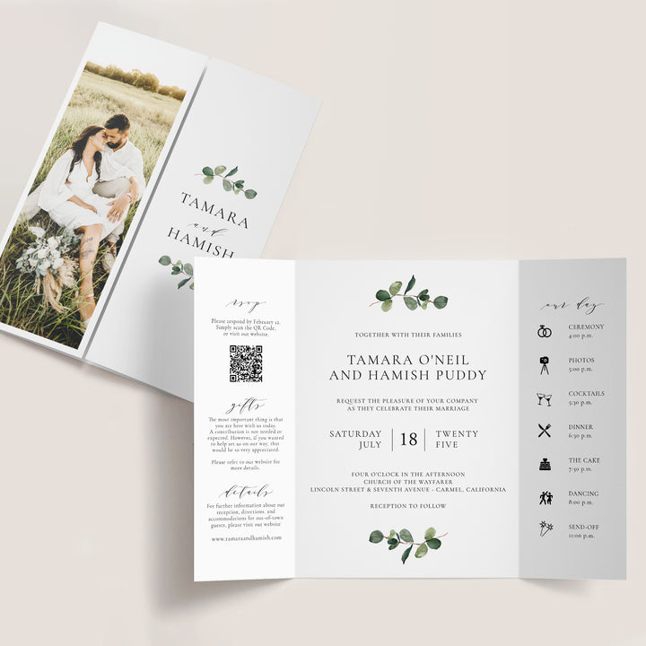 Watercolor Eucalyptus Gatefold Invitation with couple in the grass