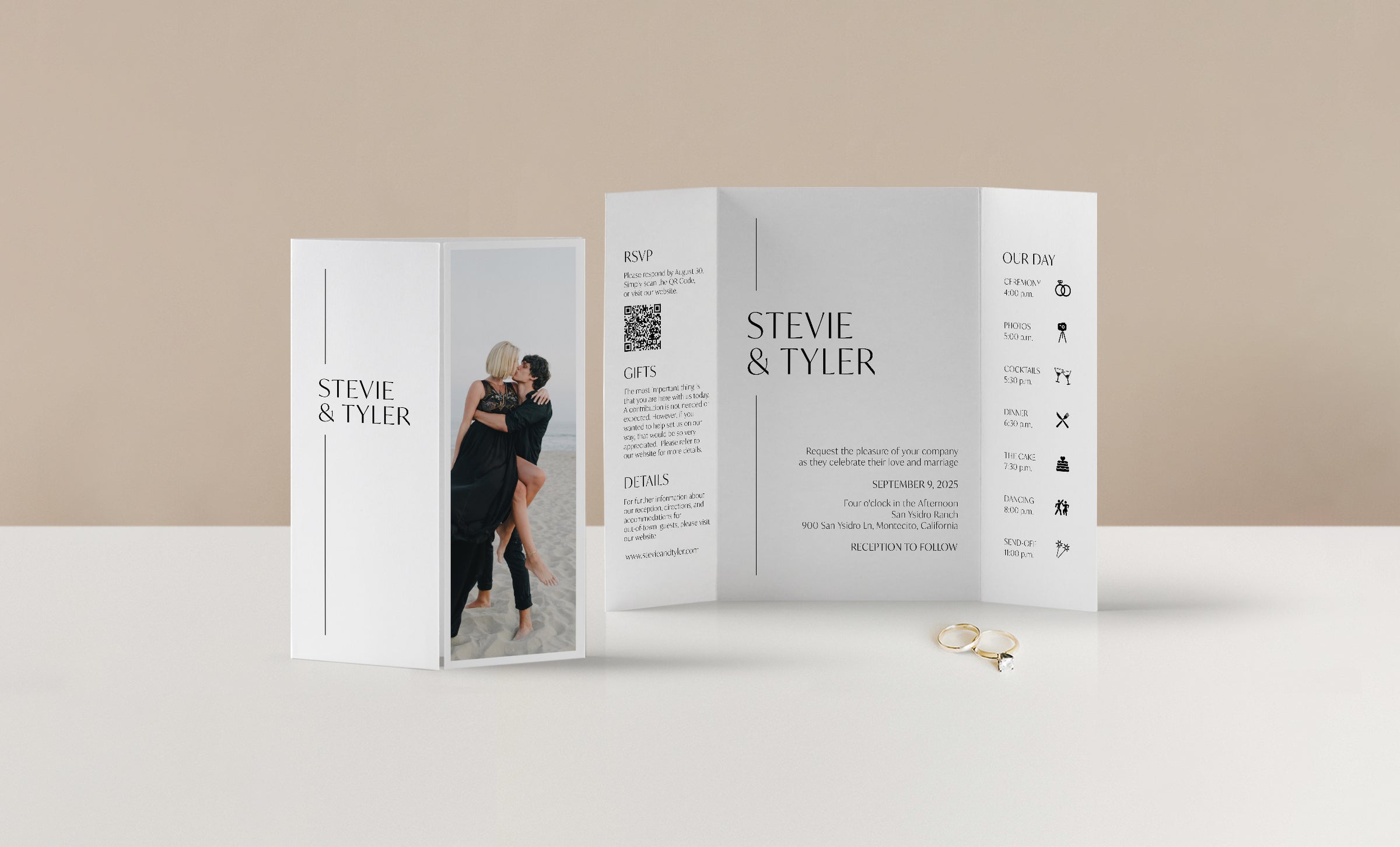 Gatefold Invitation and Wedding Rings on Neutral Background